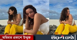 সমুদ্র সৈকতে উষ্ণতা ছড়াচ্ছেন তৃপ্তি 