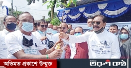 নীলফামারীতে তাঁতী লীগের গাছের চারা ও মাস্ক বিতরণ